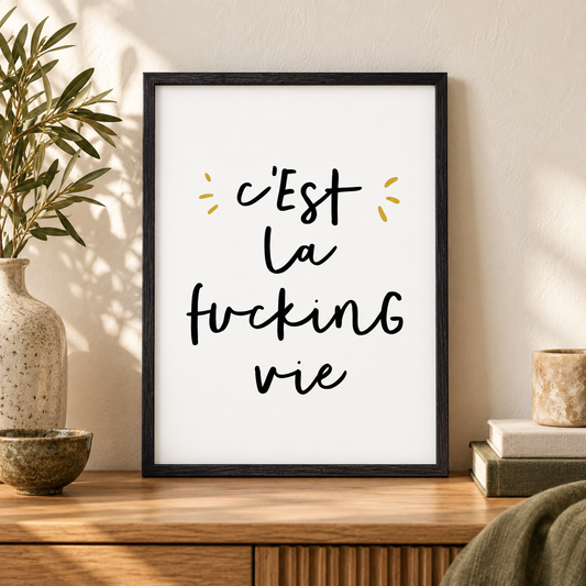 C'est La Fucking Vie Print — close lifestyle view, black oak frame