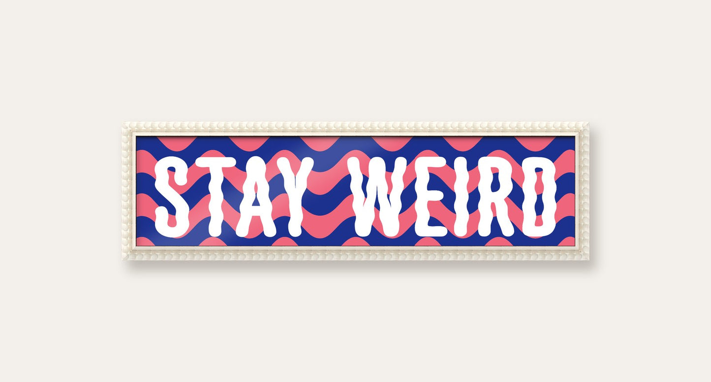 Stay Weird panoramic print in a white bobbin frame