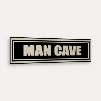 Man Cave panoramic print in a matt black frame, angled view