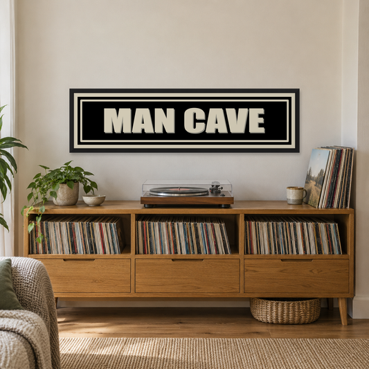 Man Cave Panoramic Print — wider room setting, matt black wood