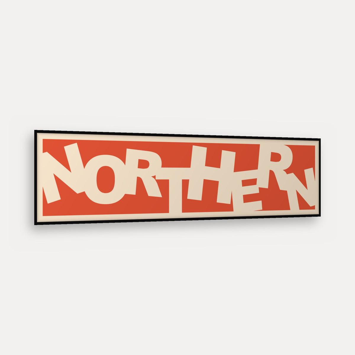 Northern panoramic print in a matt black frame, angled view