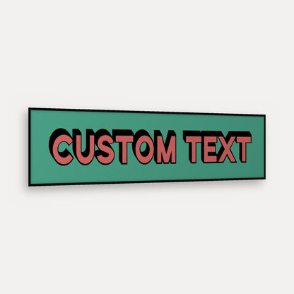 Personalised Bold Text panoramic print in a matt black frame, angled view
